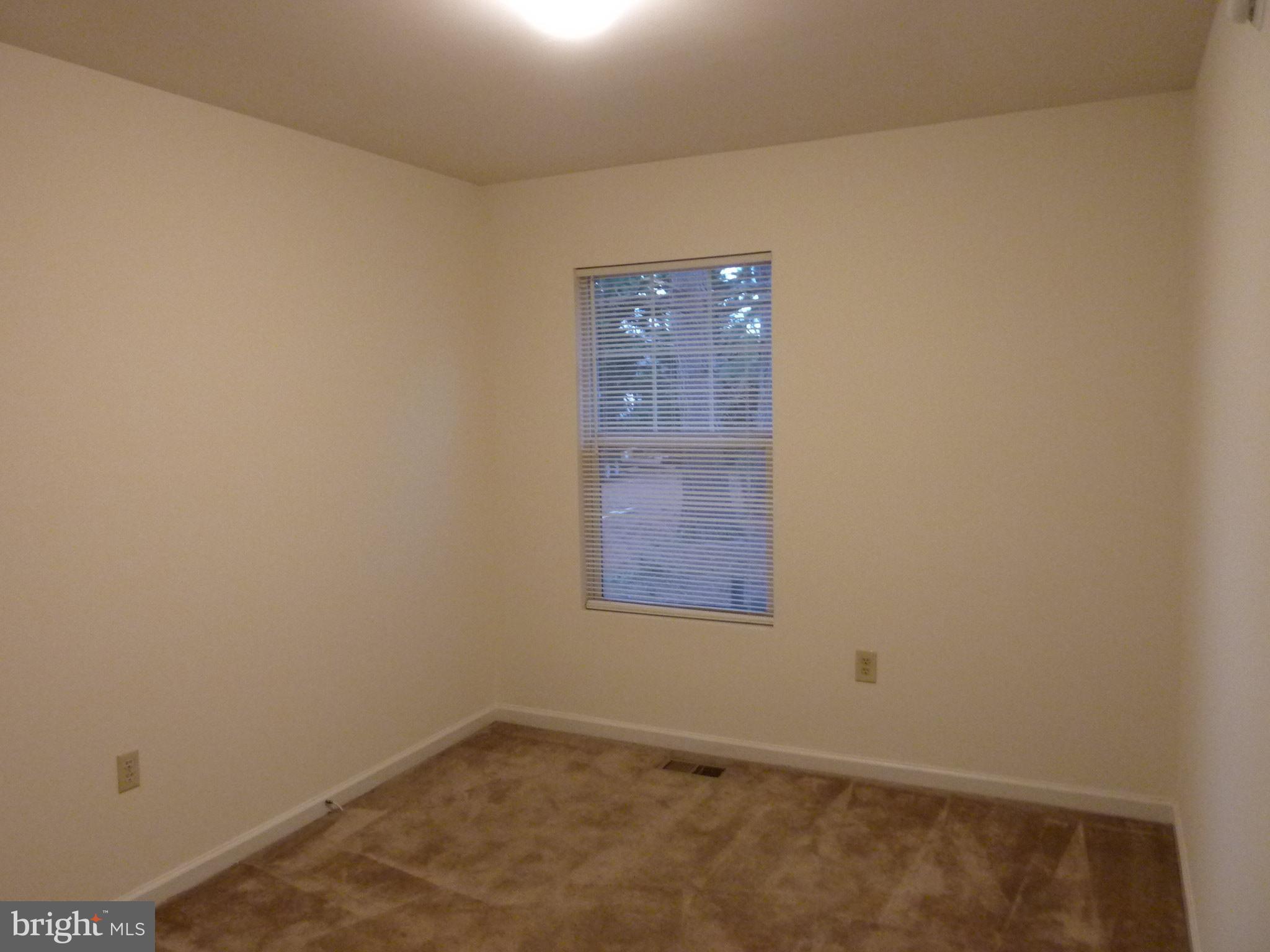 309 Decatur Avenue Salisbury, MD 21804 - Photo 7 of 15 an empty room with windows