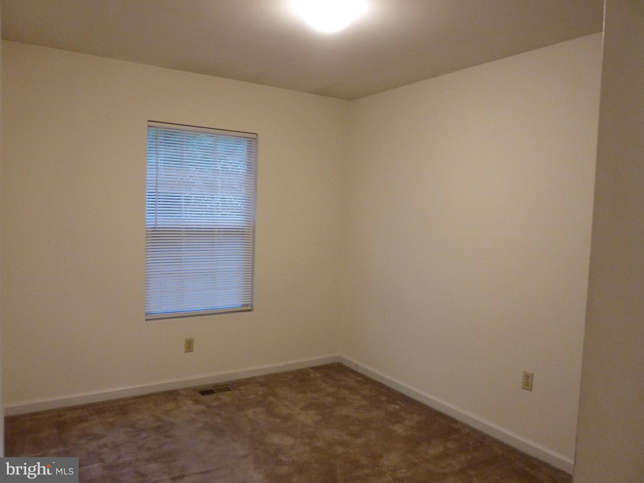 309 Decatur Avenue Salisbury, MD 21804 - Photo 10 of 15 an empty room with windows