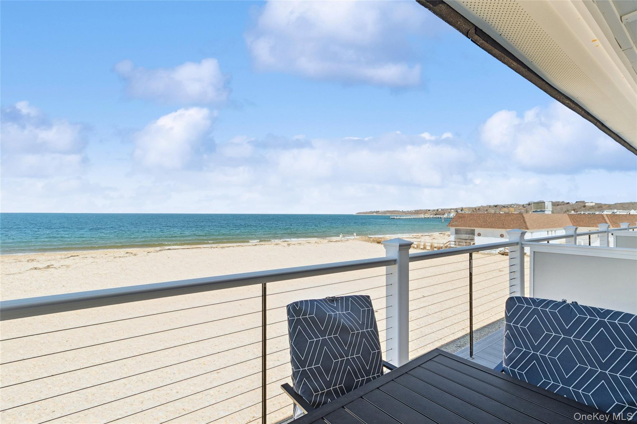 16 Navy Road, Unit 206 Montauk, NY 11954 - Photo 13 of 18 a view of ocean from a balcony