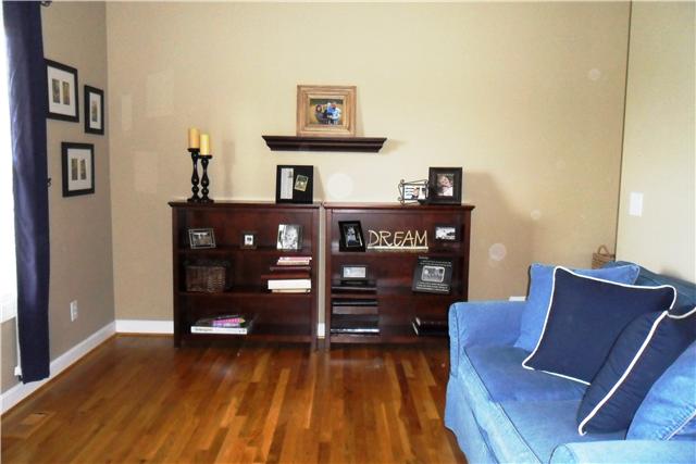 2228 Toby Robertson Road Spring Hill, TN 37174 - Photo 2 of 20 THE SITTING ROOM IS A GREAT PLACE TO ENTERTAIN GUESTS.