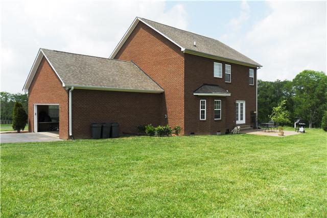 2228 Toby Robertson Road Spring Hill, TN 37174 - Photo 12 of 20 REAR VIEW OF THE HOME. HOME HAS A TWO-CAR ATTACHED GARAGE.