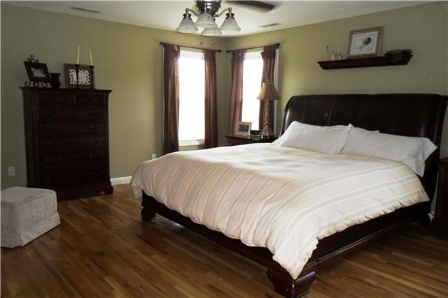2228 Toby Robertson Road Spring Hill, TN 37174 - Photo 8 of 20 THE MASTER BEDROOM HAS A FULL BATHROOM AND A LARGE WALK-IN CLOSET.
