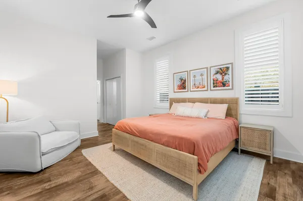 a bedroom with a bed and a couch