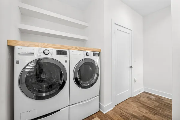 a utility room with dryer and washer