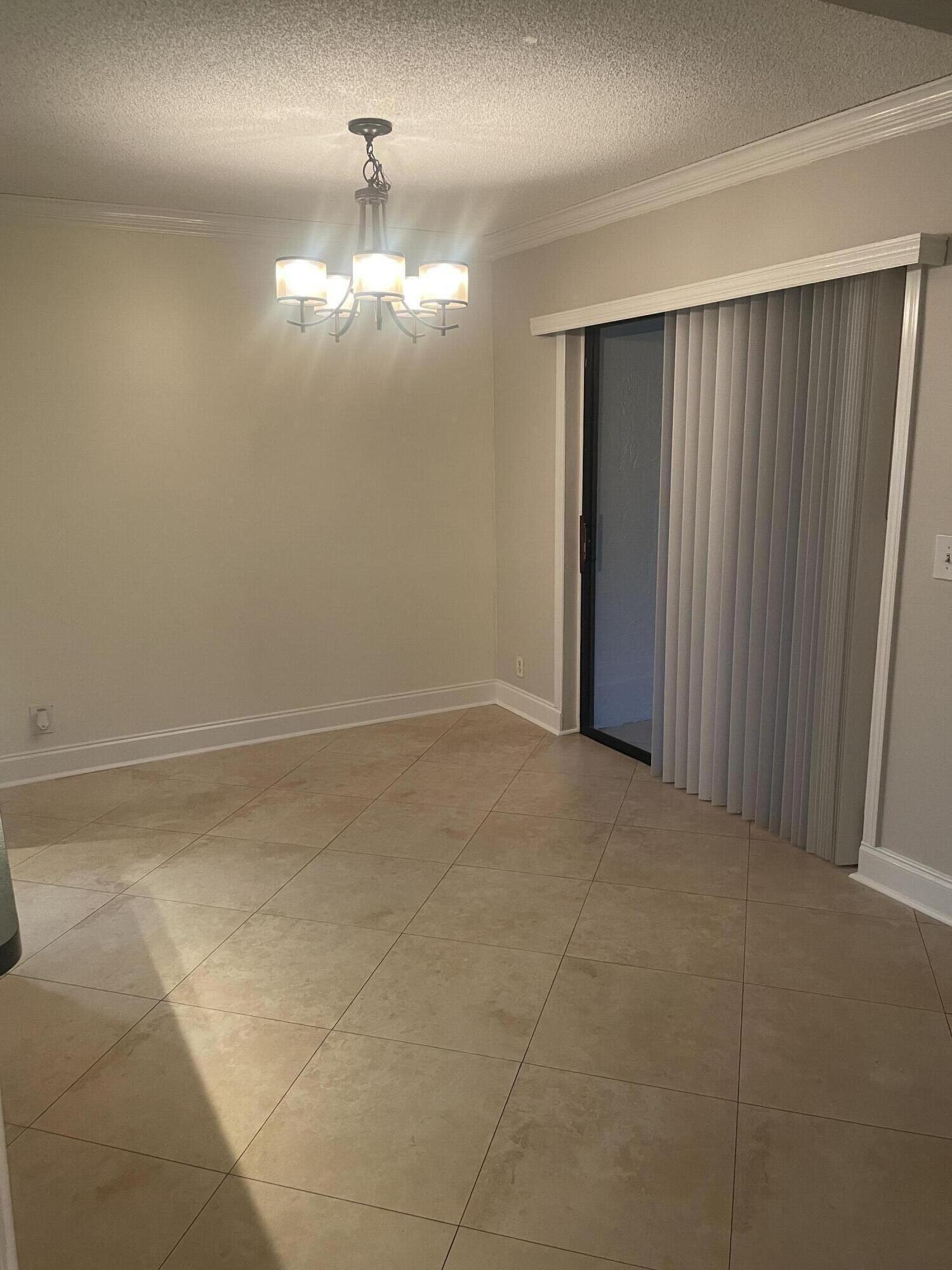 7200 Northwest 2nd Avenue, Unit 11 Boca Raton, FL 33487 - Photo 3 of 29 Dining Room