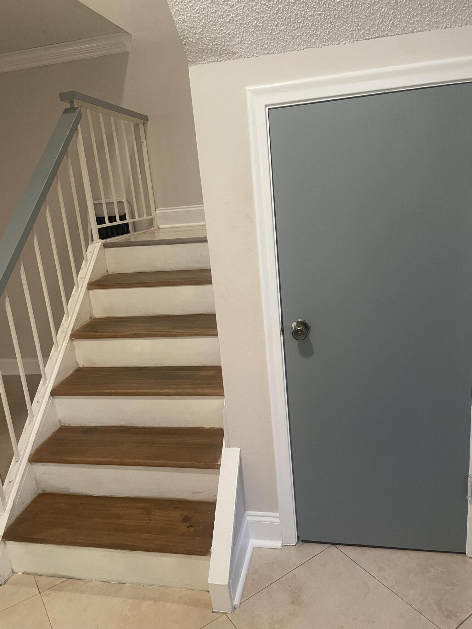 7200 Northwest 2nd Avenue, Unit 11 Boca Raton, FL 33487 - Photo 4 of 29 Stair to 2nd floor
