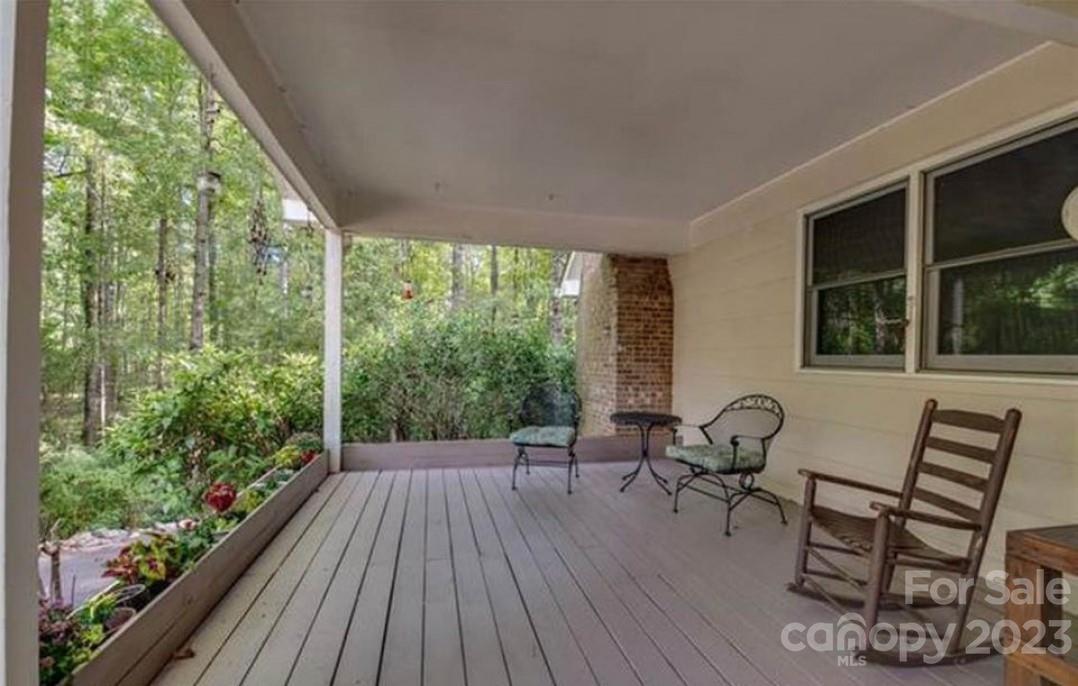 42 Hunter's Trail Tryon, NC 28782 - Photo 3 of 13 a view of a two chairs in the balcony