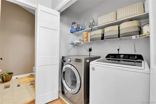 a utility room with dryer and washer