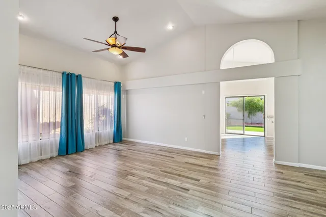 a kitchen with a sink and large window