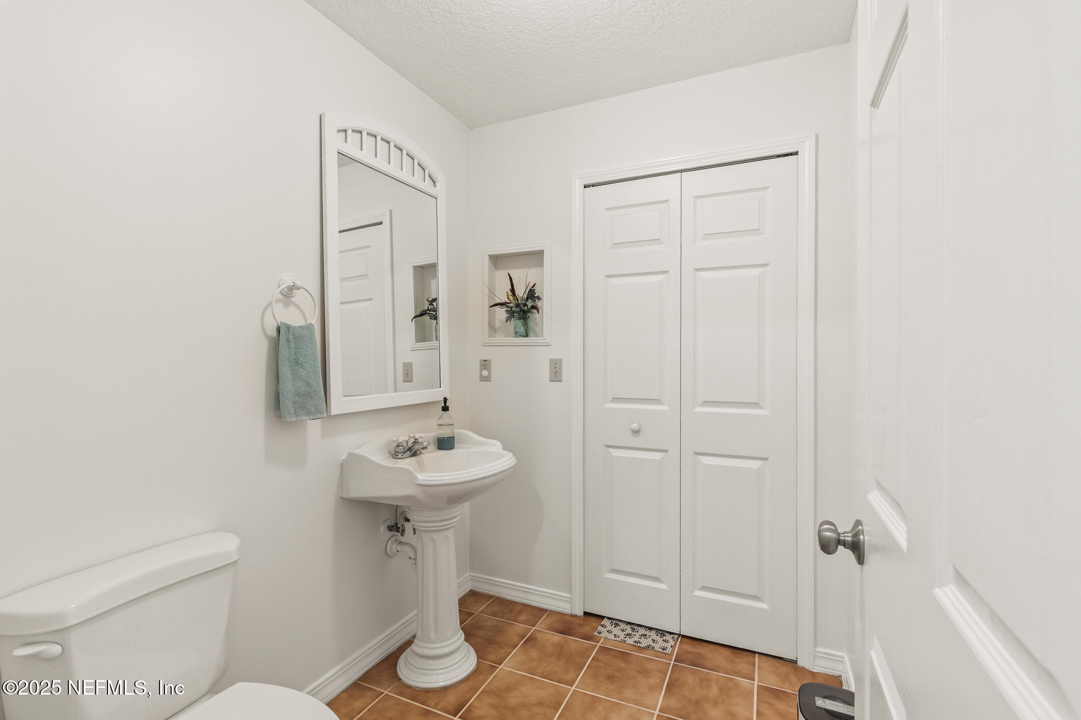 120 Stokes Landing Road St. Augustine, FL 32095 - Photo 32 of 78 a bathroom with a sink toilet and shower