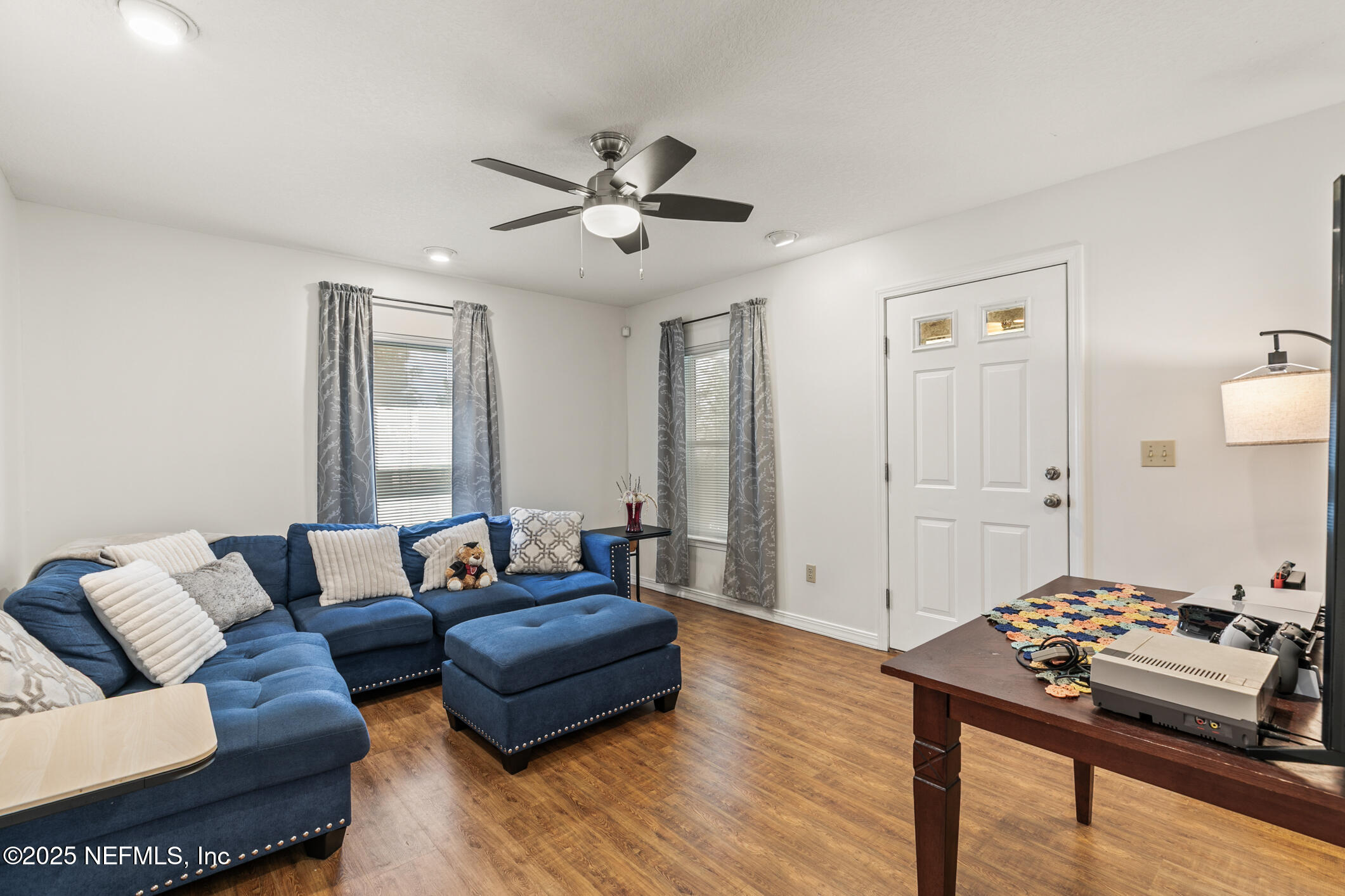 120 Stokes Landing Road St. Augustine, FL 32095 - Photo 35 of 78 a living room with furniture and wooden floor