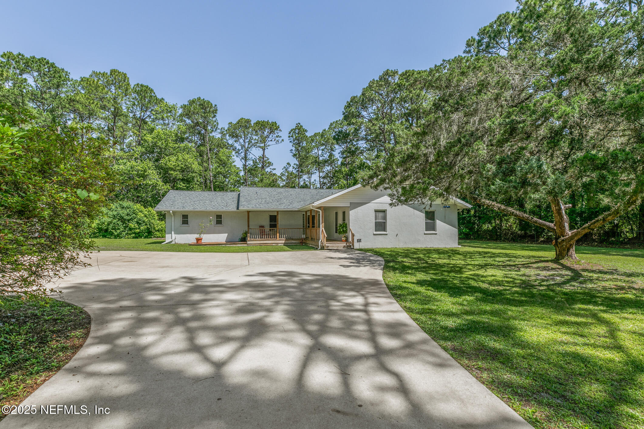 120 Stokes Landing Road St. Augustine, FL 32095 - Photo 3 of 78 a front view of a house with garden