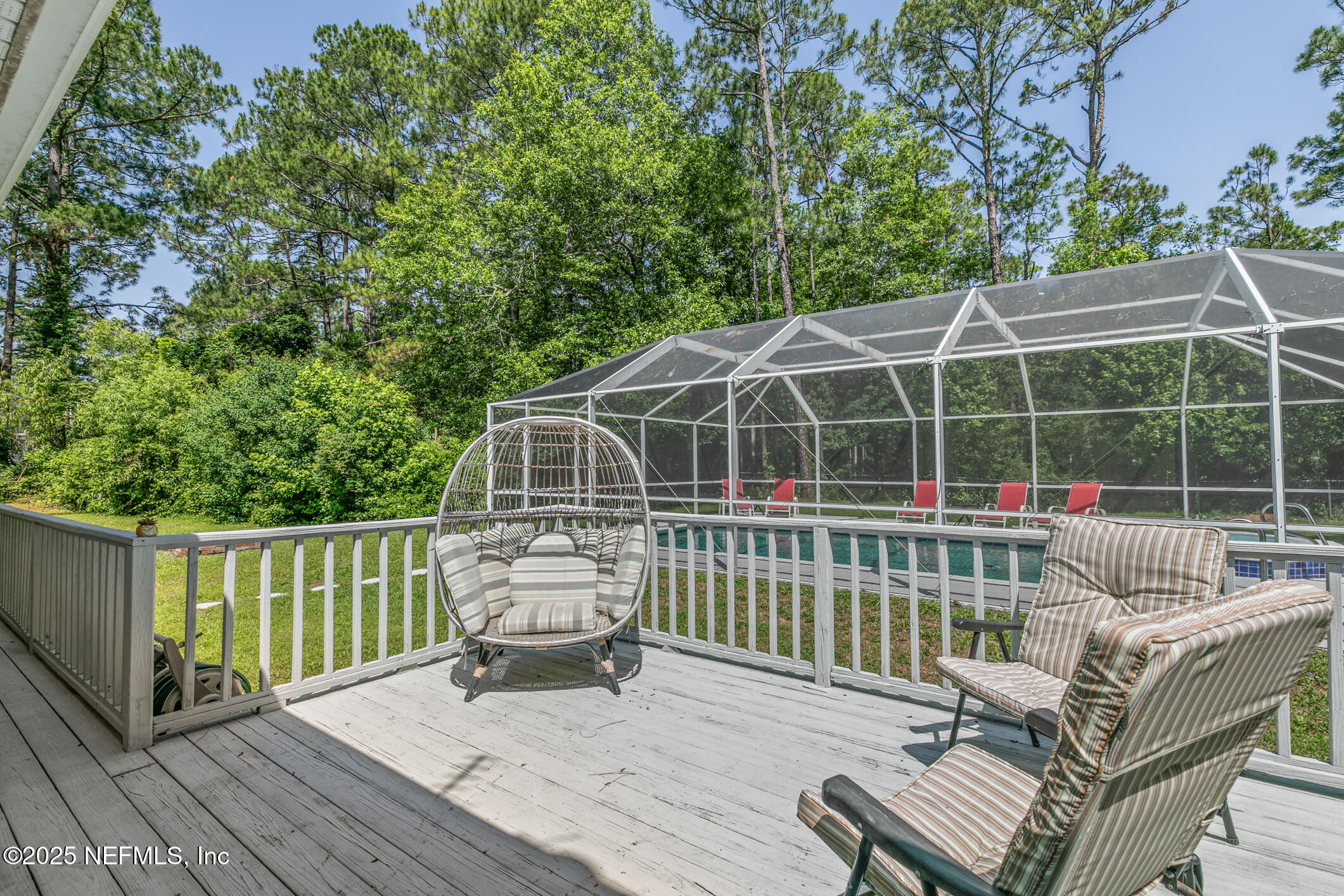 120 Stokes Landing Road St. Augustine, FL 32095 - Photo 42 of 78 a view of a chair and table on the deck
