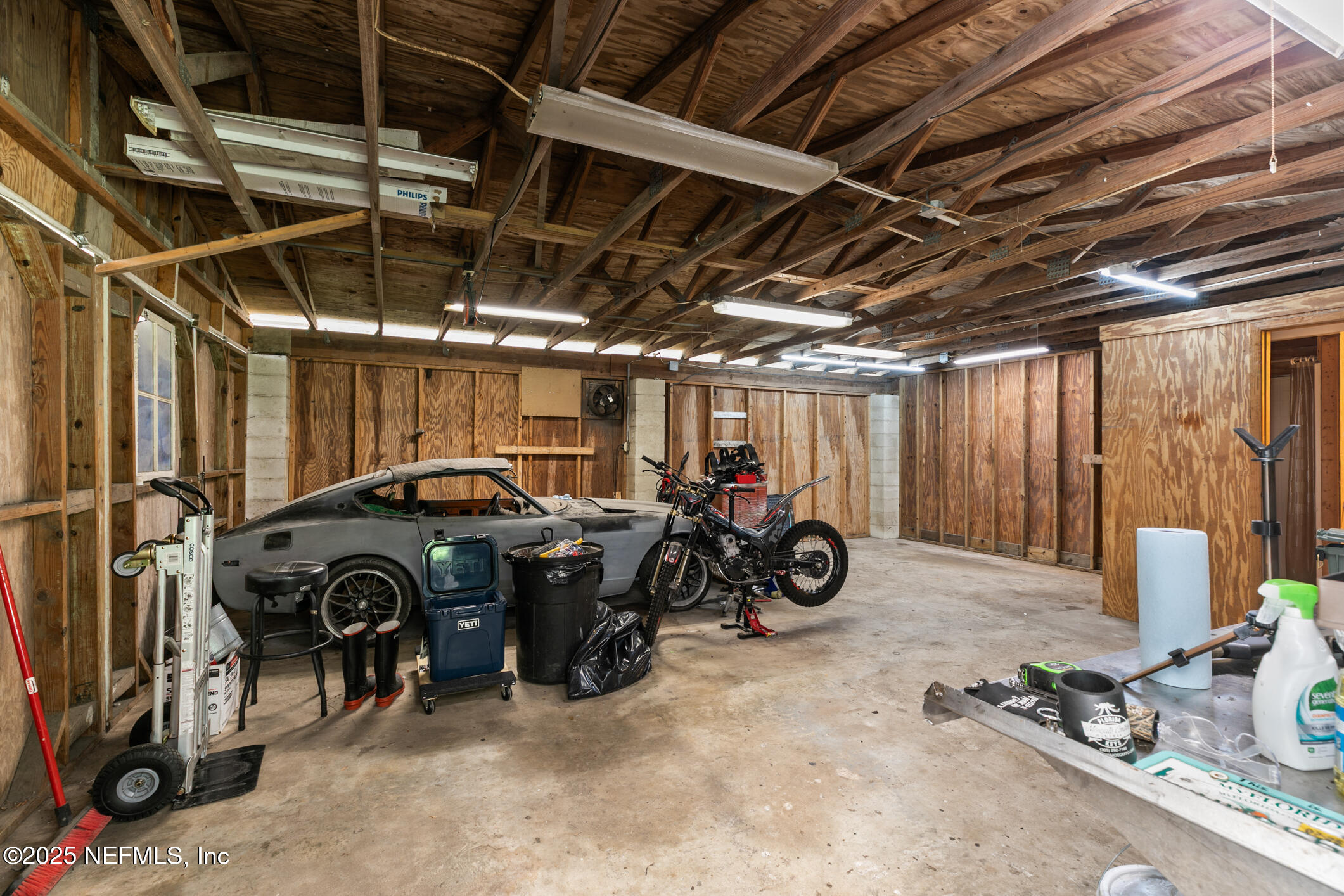 120 Stokes Landing Road St. Augustine, FL 32095 - Photo 49 of 78 a view of a garage with parked cars