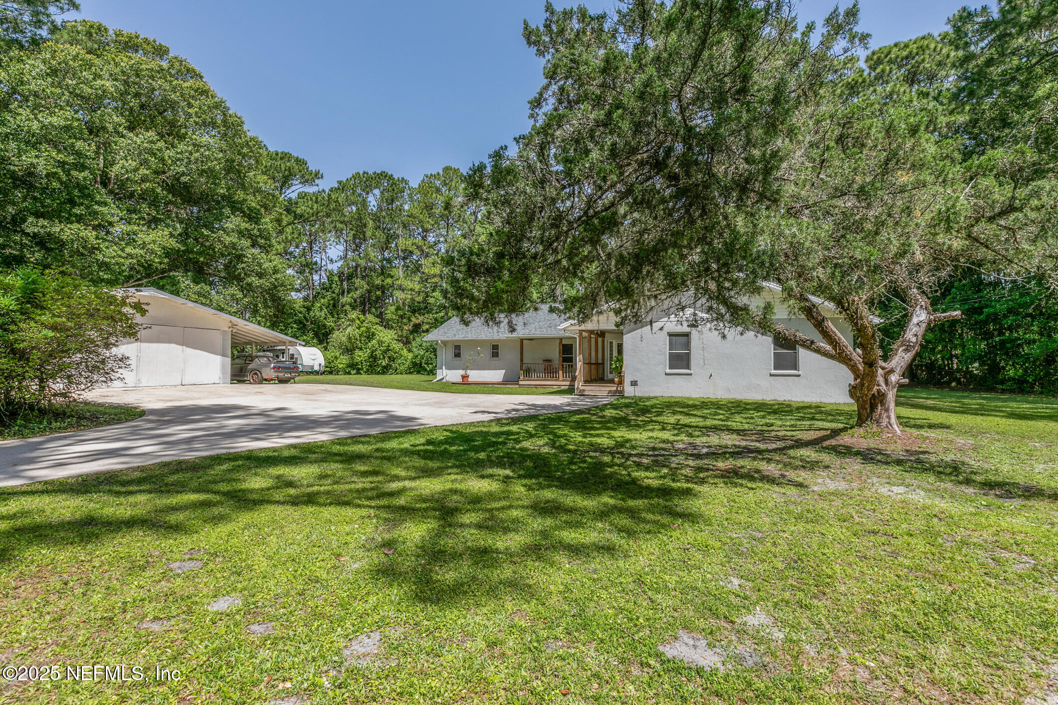 120 Stokes Landing Road St. Augustine, FL 32095 - Photo 57 of 78 a view of a house with a yard