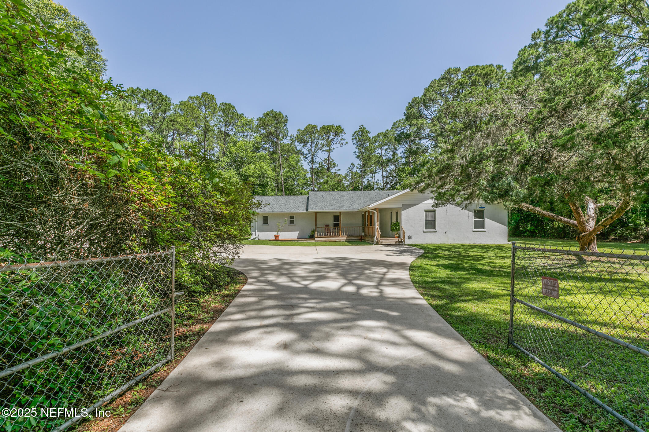 120 Stokes Landing Road St. Augustine, FL 32095 - Photo 58 of 78 a view of a house with yard and a garden