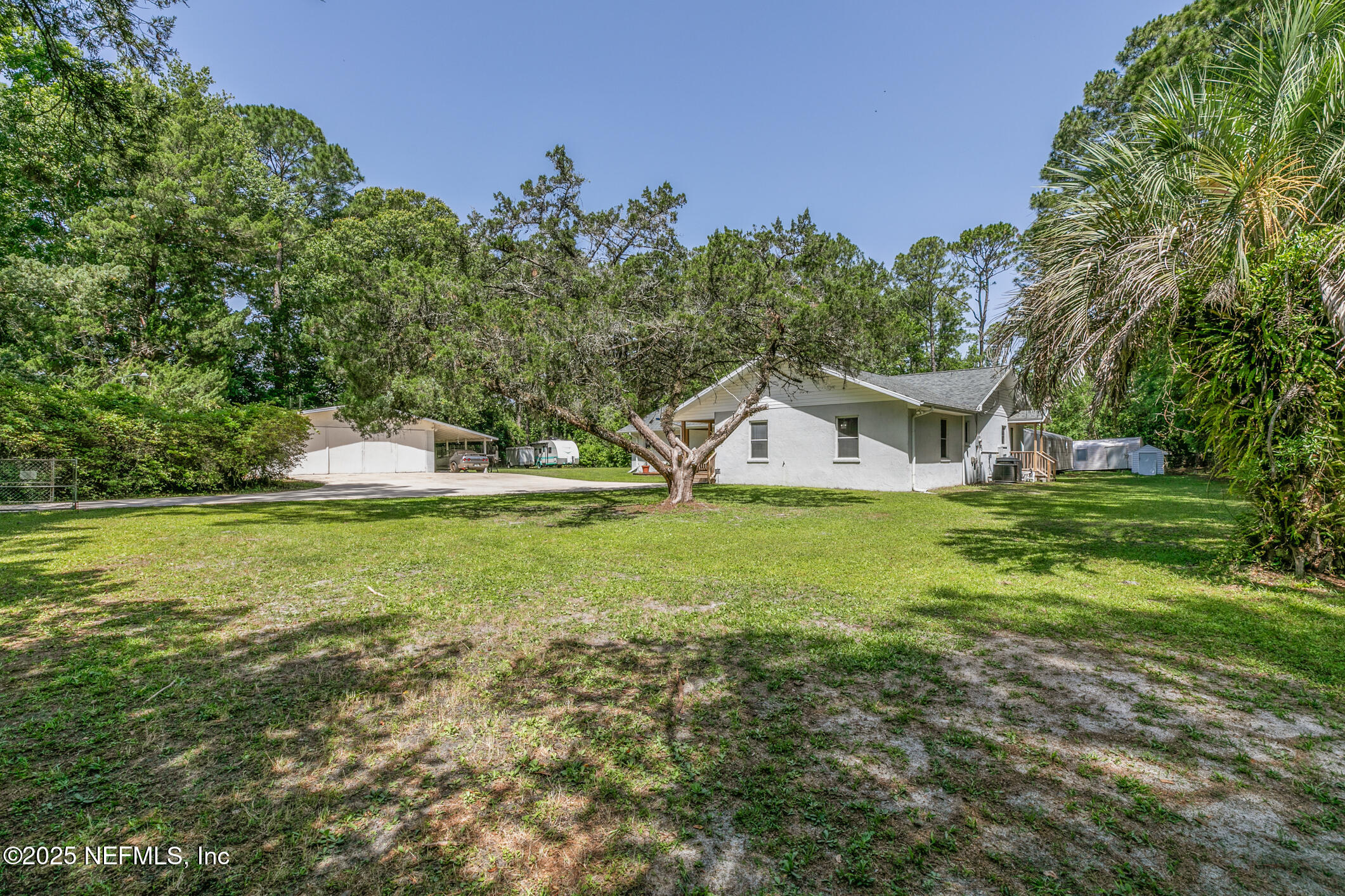 120 Stokes Landing Road St. Augustine, FL 32095 - Photo 60 of 78 a house with swimming pool in front of it