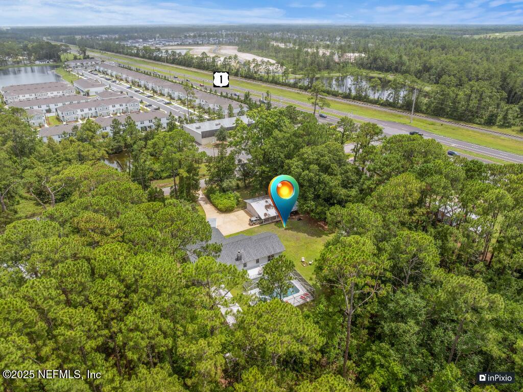 120 Stokes Landing Road St. Augustine, FL 32095 - Photo 62 of 78 an aerial view of a house with a swimming pool