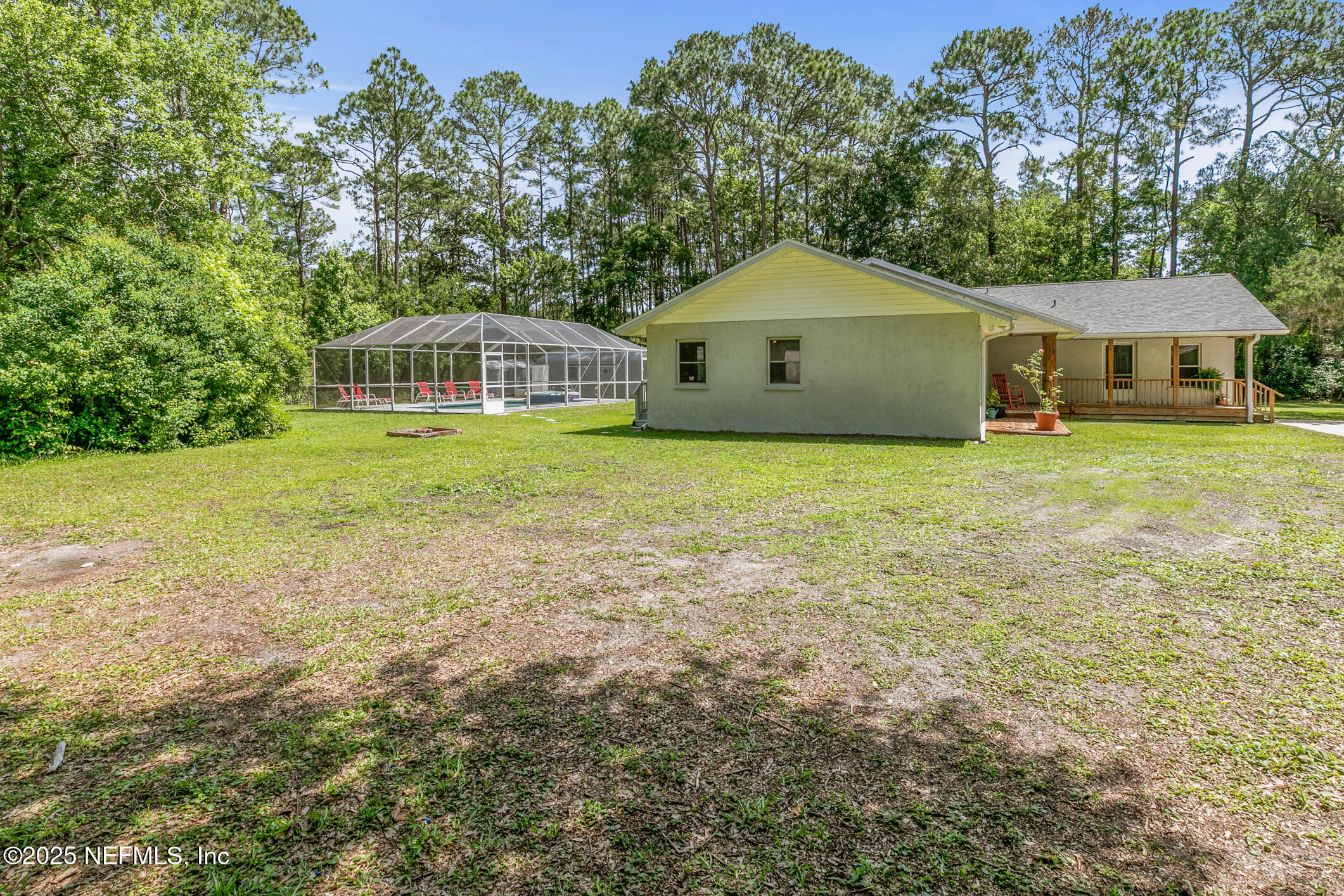 120 Stokes Landing Road St. Augustine, FL 32095 - Photo 77 of 78 a front view of a house with a garden