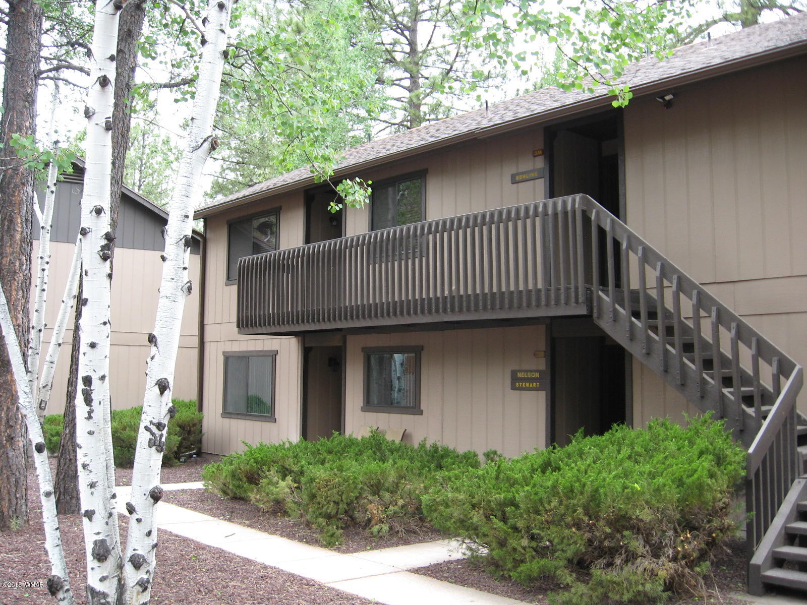 4639 Buck Springs Road Pinetop, AZ 85935 - Photo 1 of 19 a view of a house with a balcony