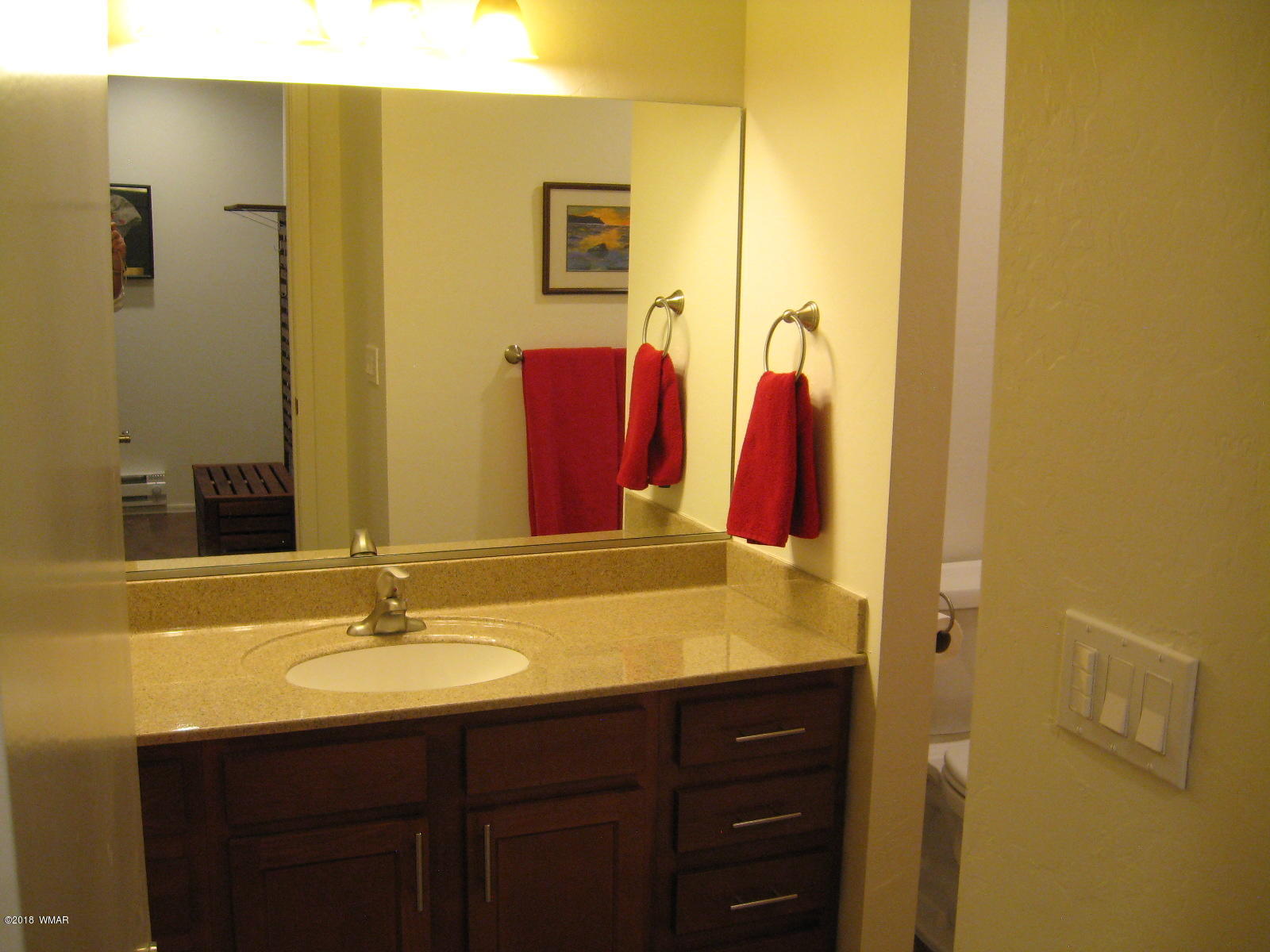 4639 Buck Springs Road Pinetop, AZ 85935 - Photo 11 of 19 a bathroom with a sink and a mirror
