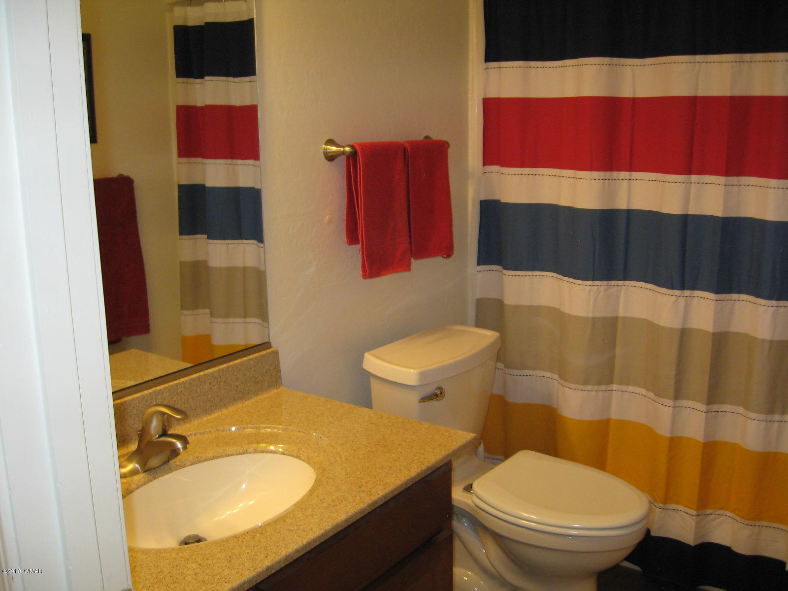 4639 Buck Springs Road Pinetop, AZ 85935 - Photo 14 of 19 a bathroom with a sink toilet and shower