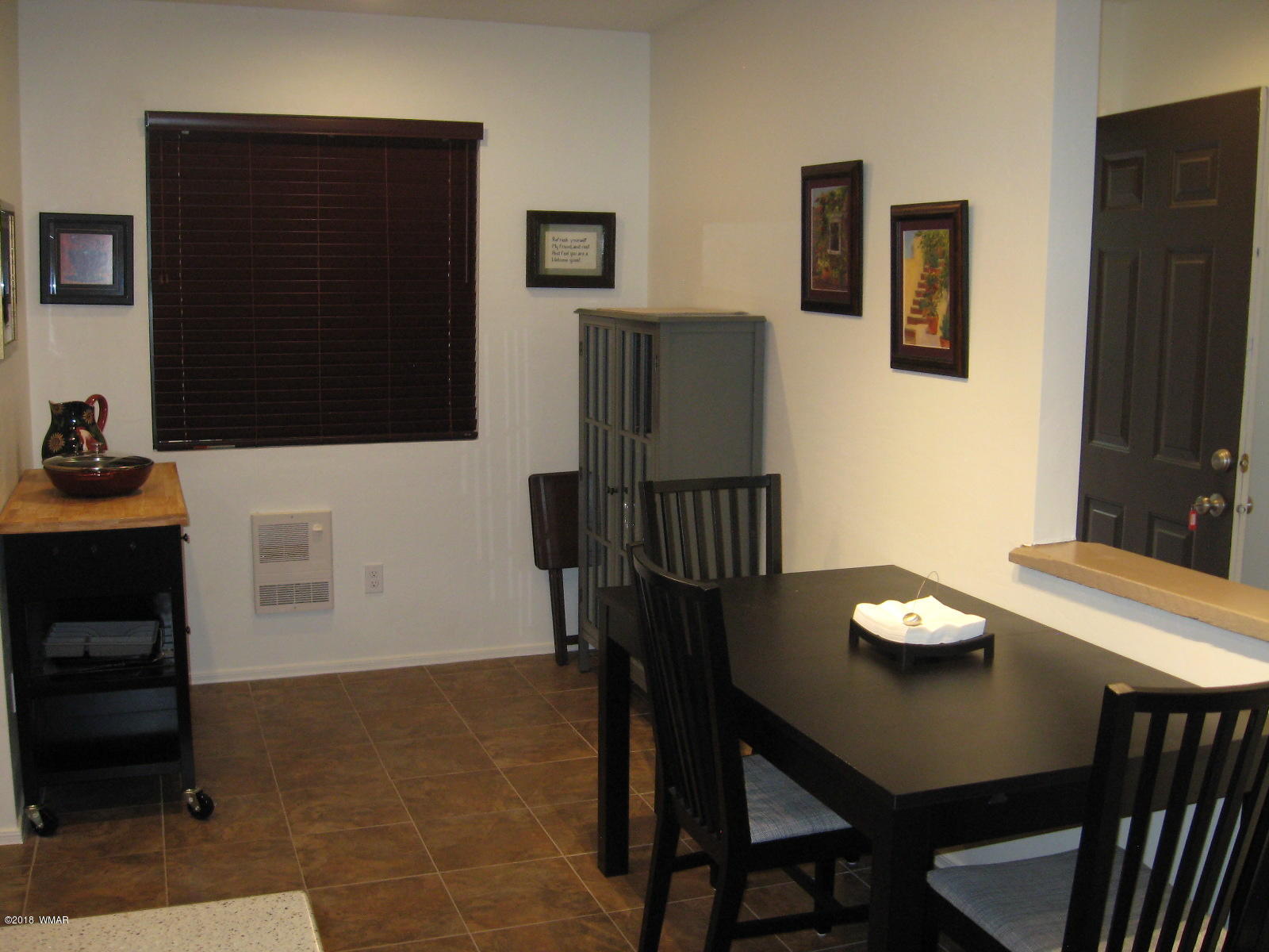 4639 Buck Springs Road Pinetop, AZ 85935 - Photo 3 of 19 a view of a dining room with furniture