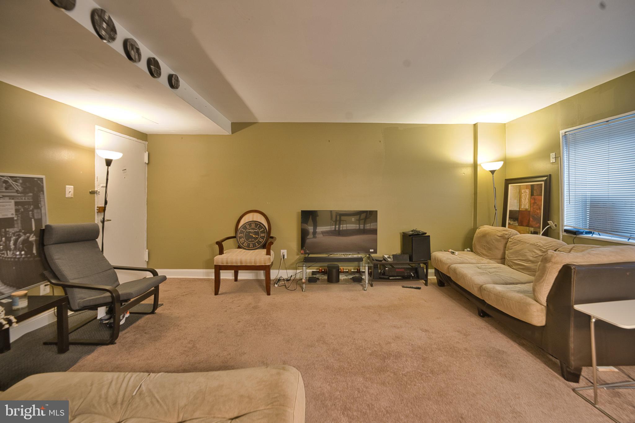 1005 Chillum Road, Unit 117 Hyattsville, MD 20782 - Photo 13 of 16 a living room with furniture
