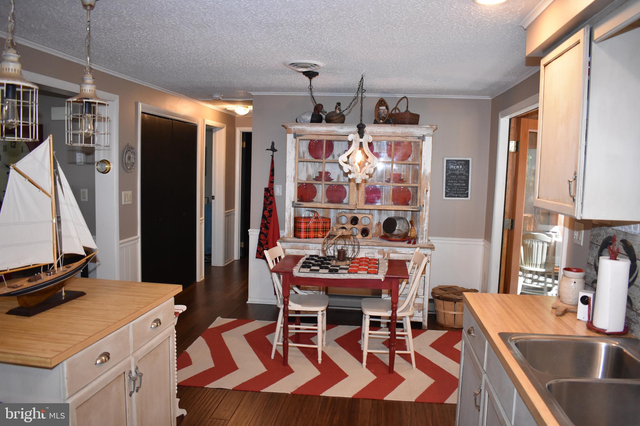 21435 Sinclair Road Tilghman, MD 21671 - Photo 18 of 38 Kitchen to dining room