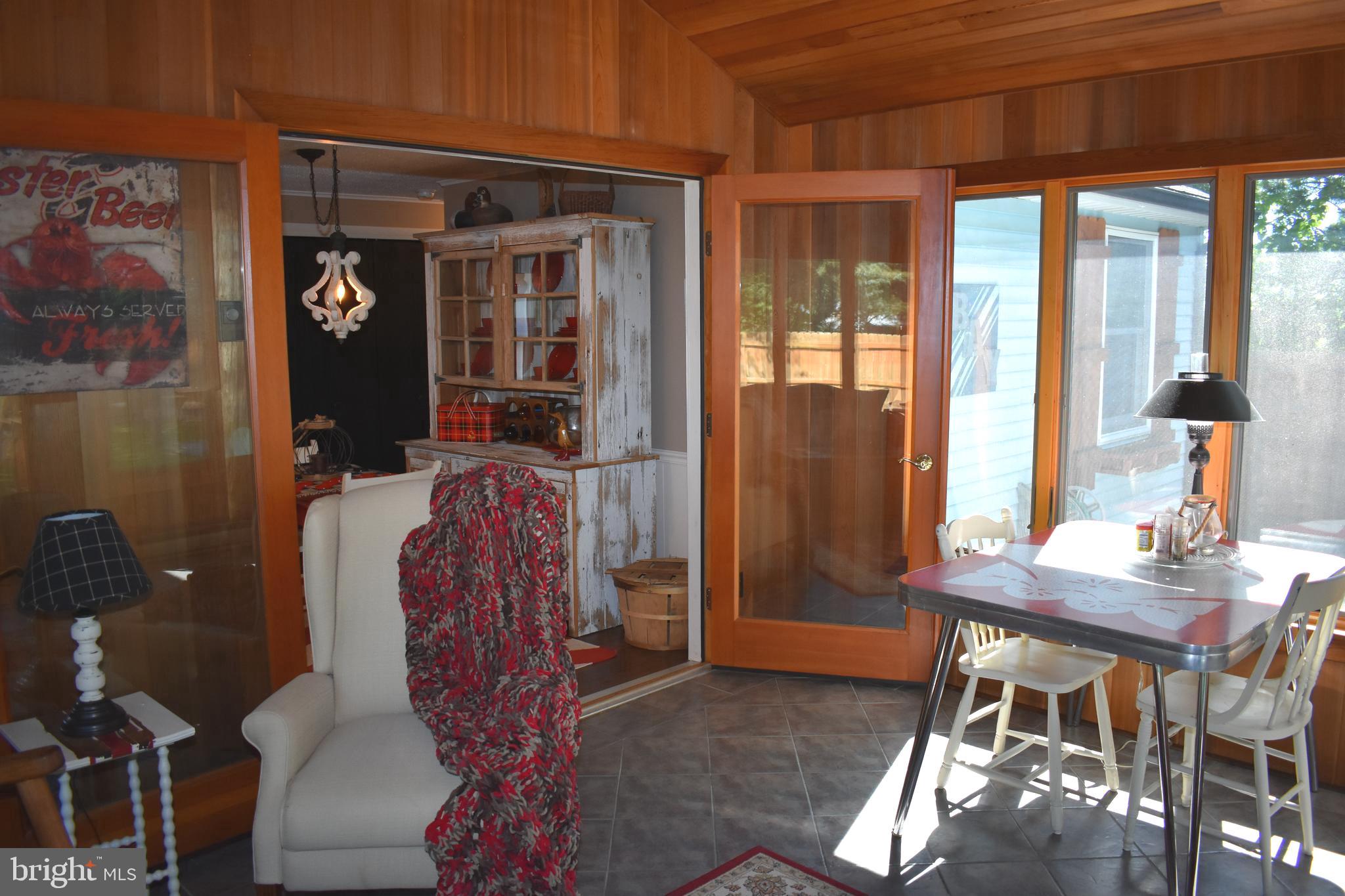 21435 Sinclair Road Tilghman, MD 21671 - Photo 30 of 38 Sunroom