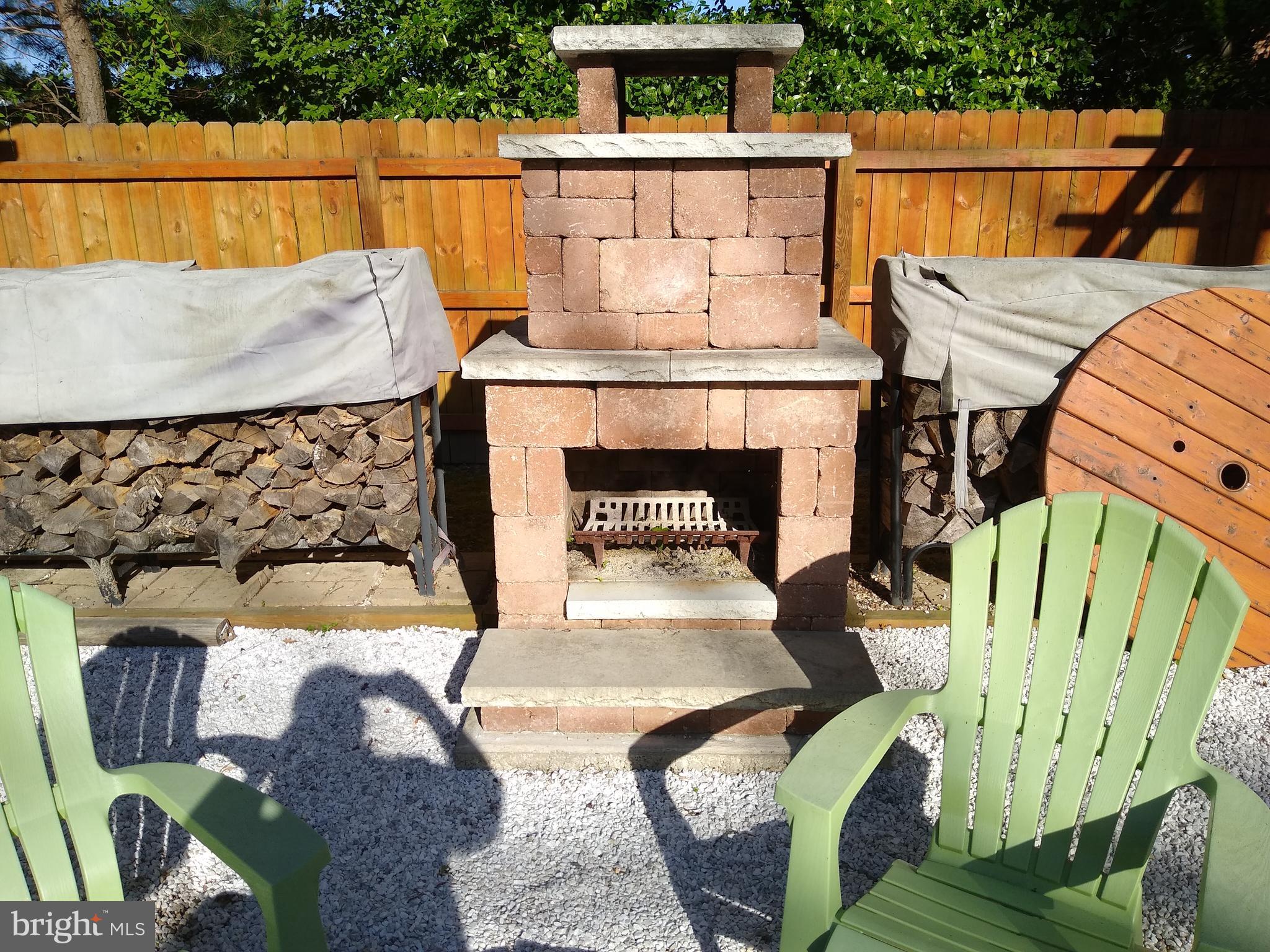 21435 Sinclair Road Tilghman, MD 21671 - Photo 8 of 38 Outdoor fireplace