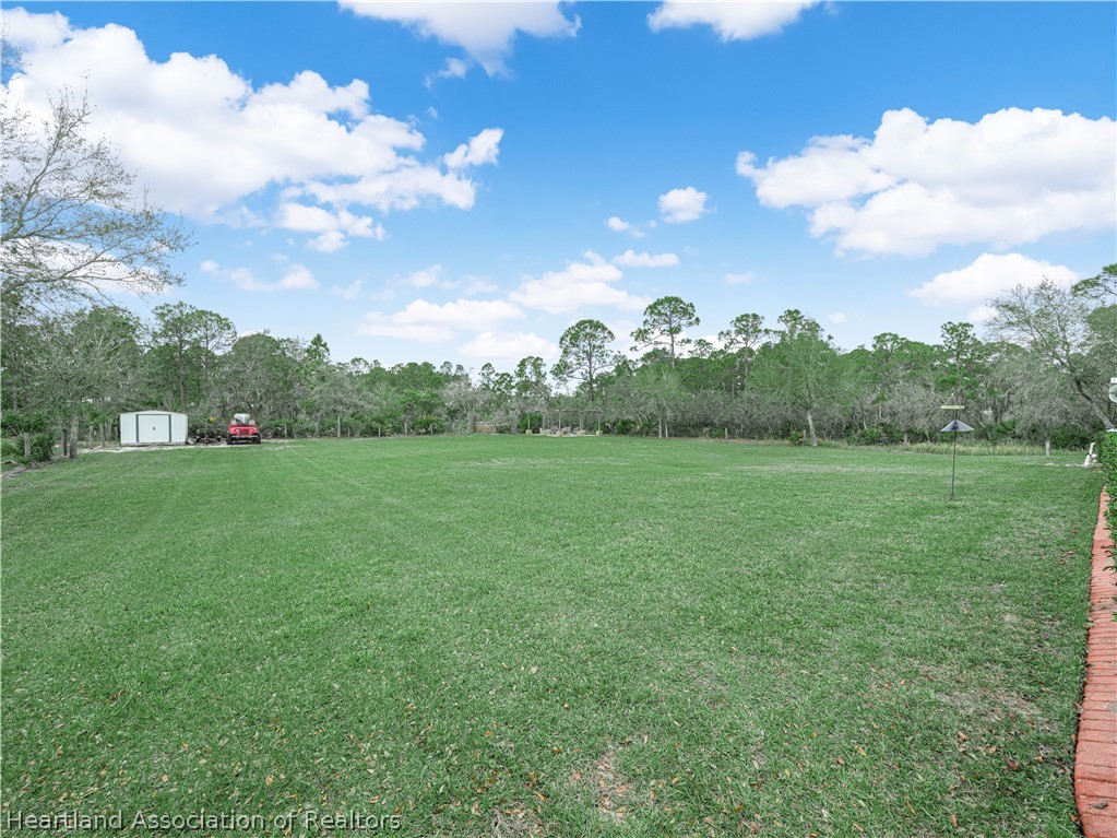 5721 Golden Road Sebring, FL 33875 - Photo 34 of 42 Generous backyard space