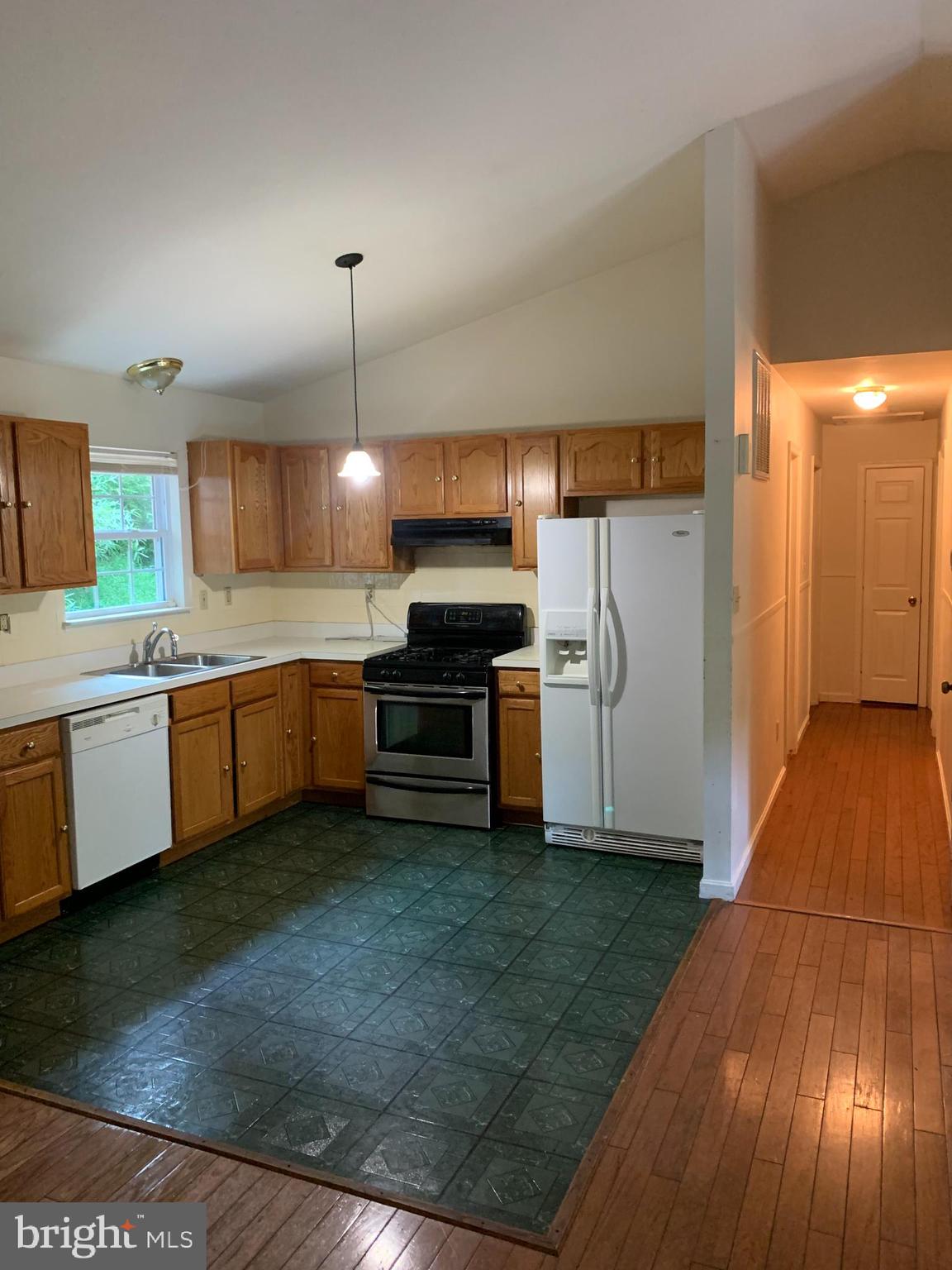 676 Flagstaff Road Lusby, MD 20657 - Photo 3 of 28 Kitchen/dining/ hall view