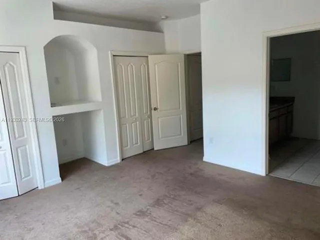 an empty room with closet