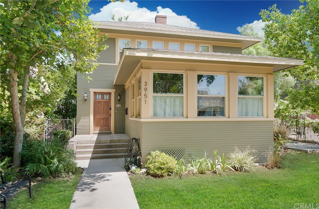 3951 3rd Street Riverside, CA 92501 - Photo 1 of 1 a front view of a house with a yard