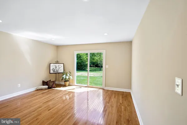 a room with a bed and a window