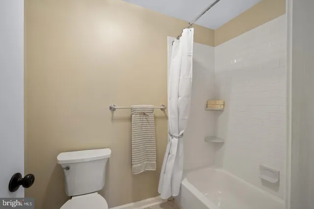 a bathroom with a sink vanity and a mirror