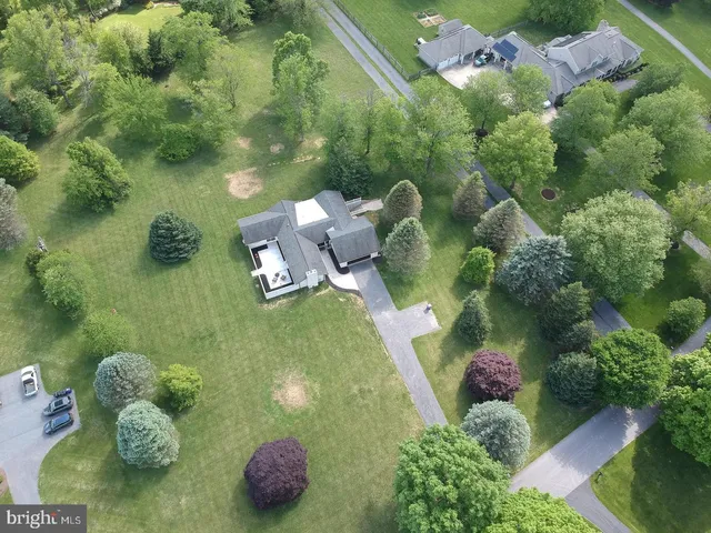 a view of a brick house with a large window