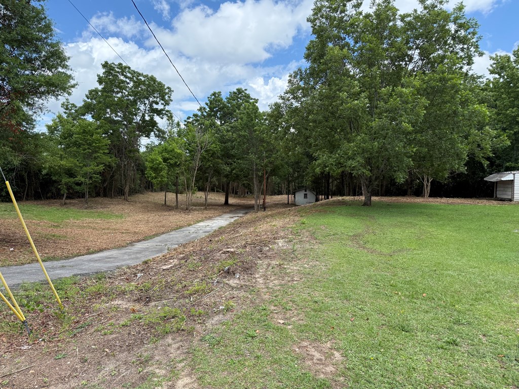 4935 Buena Vista Road Columbus, GA 31907 - Photo 3 of 24 a view of outdoor space with deck and yard