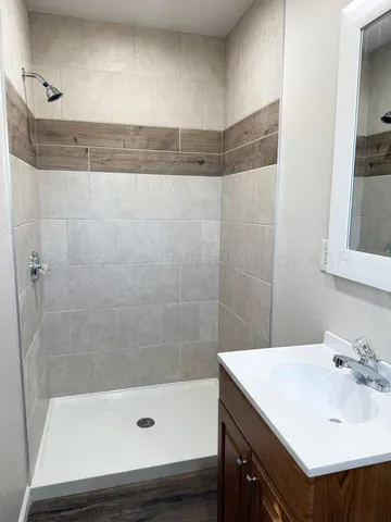 a bathroom with a sink and a bathtub