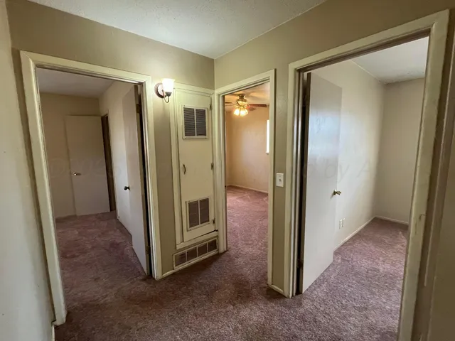a view of a hallway with elevator