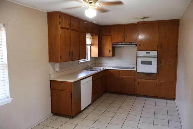 a kitchen with a cabinets and counter space
