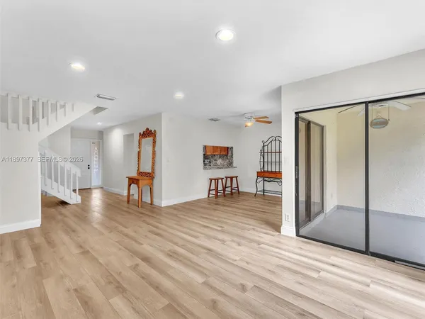 workspace with wooden floor and window