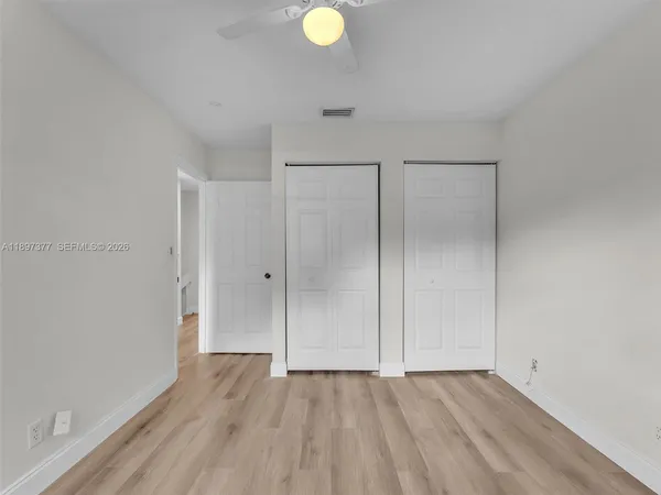 a view of a room with a large window