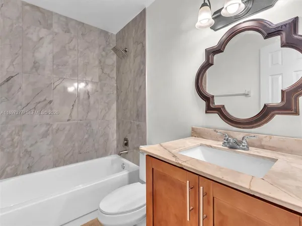 a view of a lake with a big yard