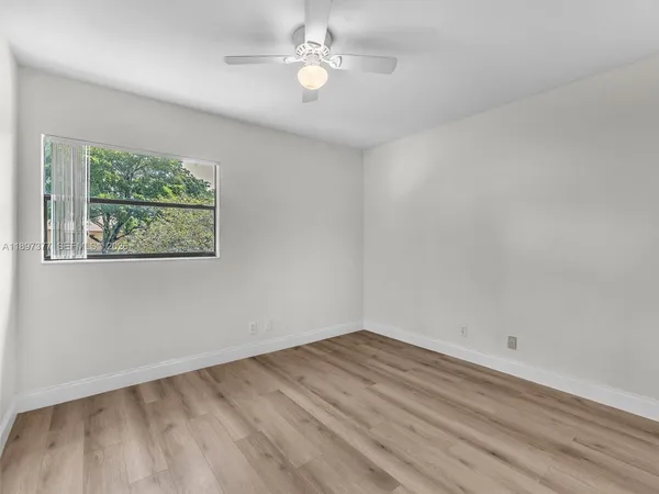 a view of a house with a big yard