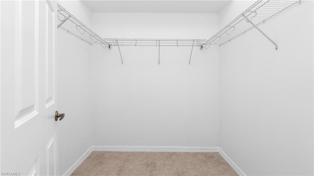 7947 Terrace Ridge Drive Temple Terrace, FL 33637 - Photo 16 of 38 Primary bedroom walk in closet