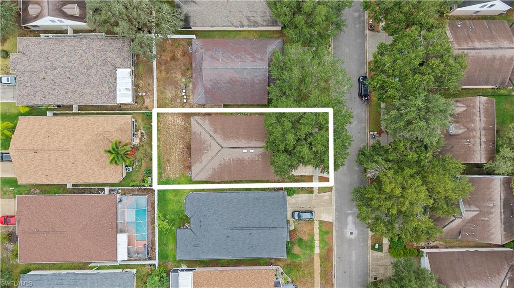 7947 Terrace Ridge Drive Temple Terrace, FL 33637 - Photo 35 of 38 Aerial view of residential area with property boundaries highlighted