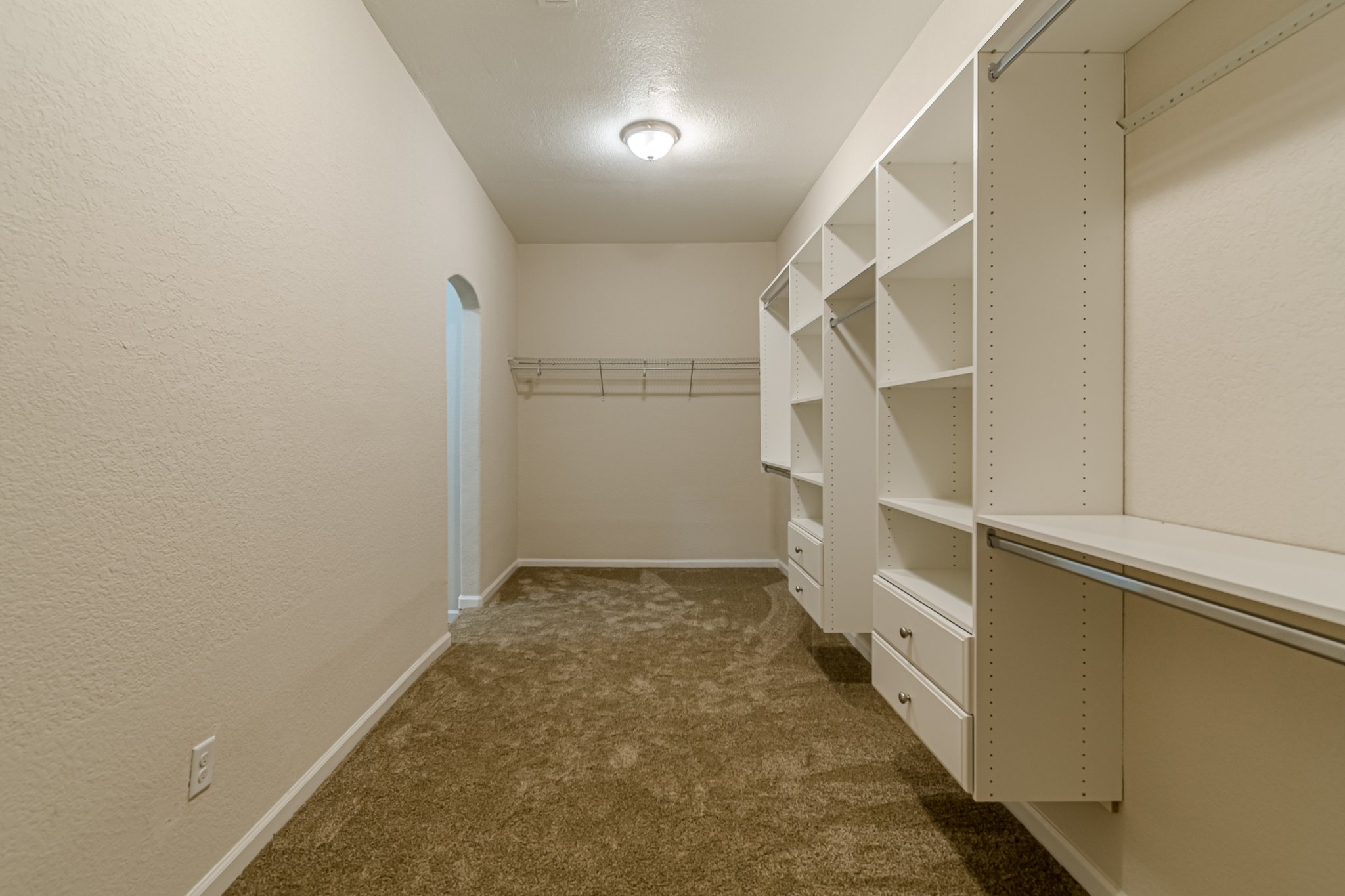 560 Persimmon Pass Fischer, TX 78623 - Photo 17 of 26 a view of hallway with stairs