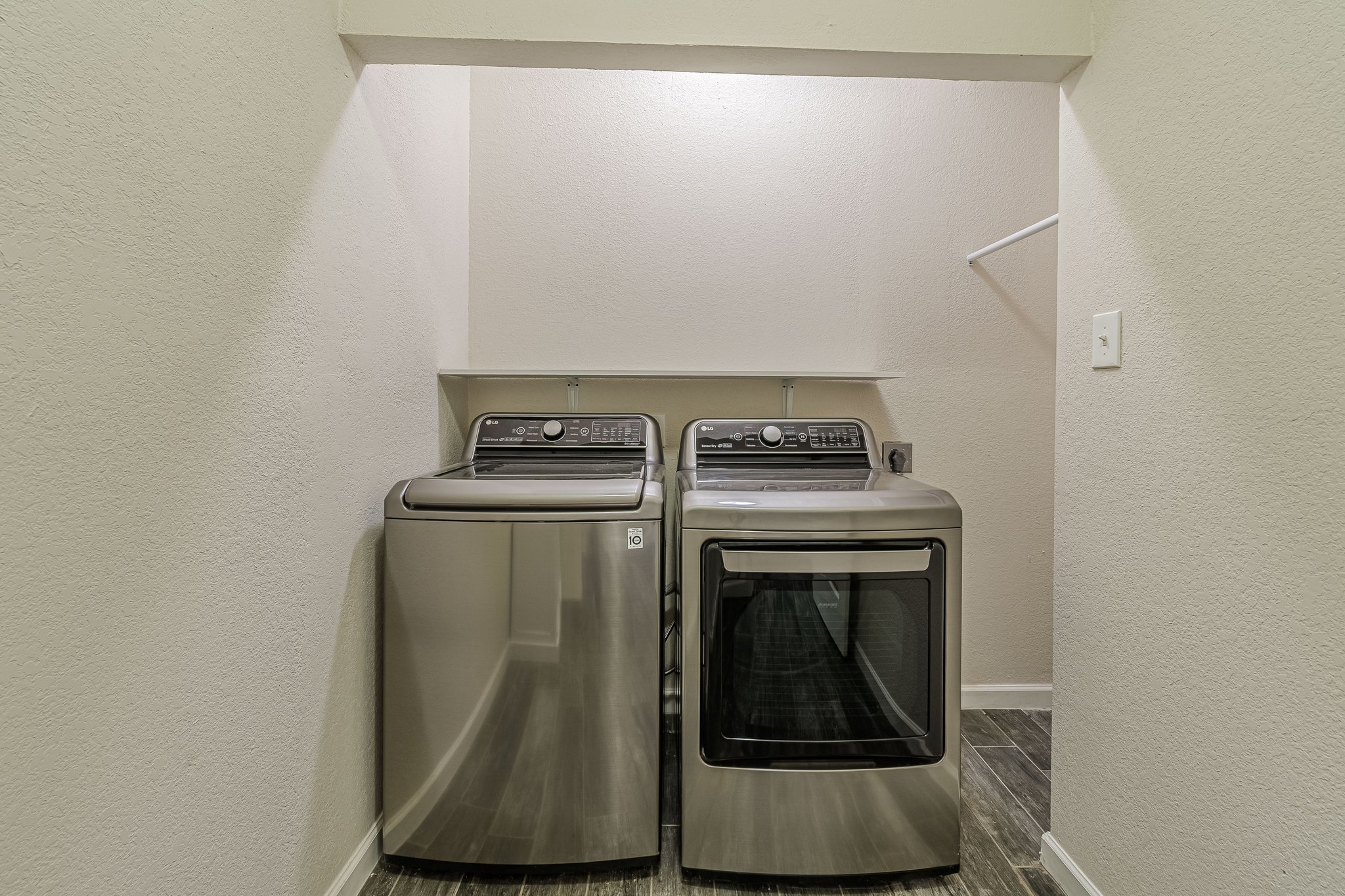 560 Persimmon Pass Fischer, TX 78623 - Photo 20 of 26 a close up view of washer and dryer